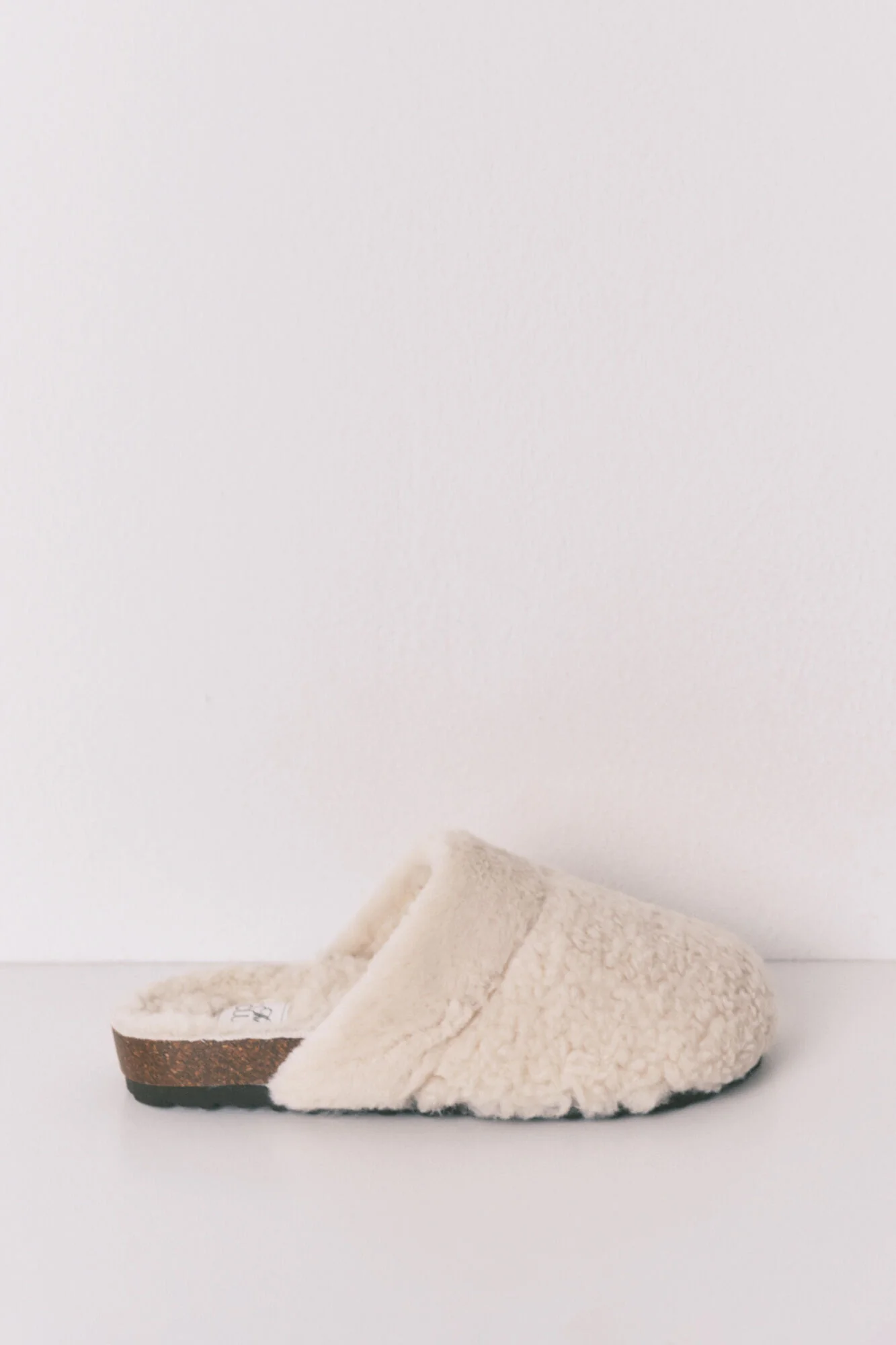 Beige sheepskin faux shearling slippers