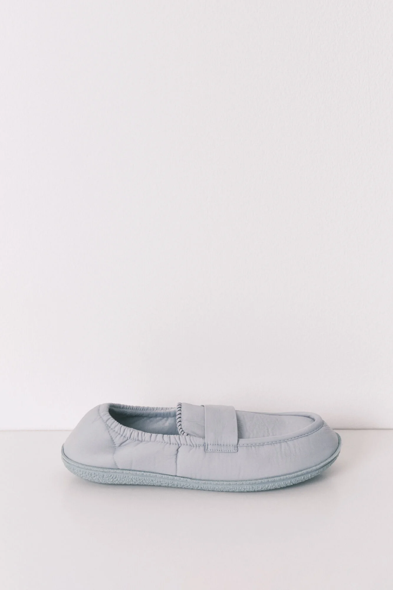 Blue loafer slippers