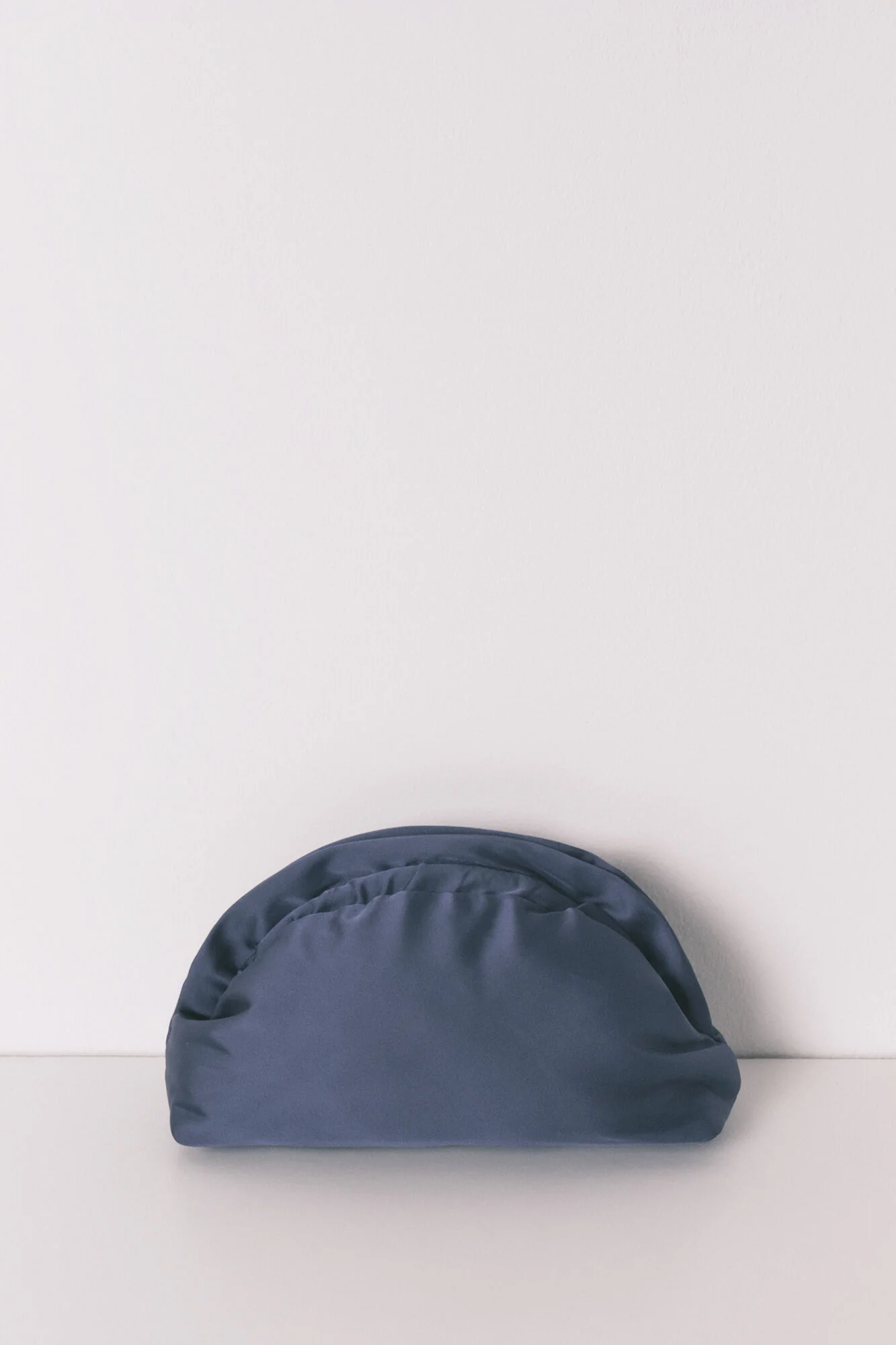 Blue satin vanity case with flap closure