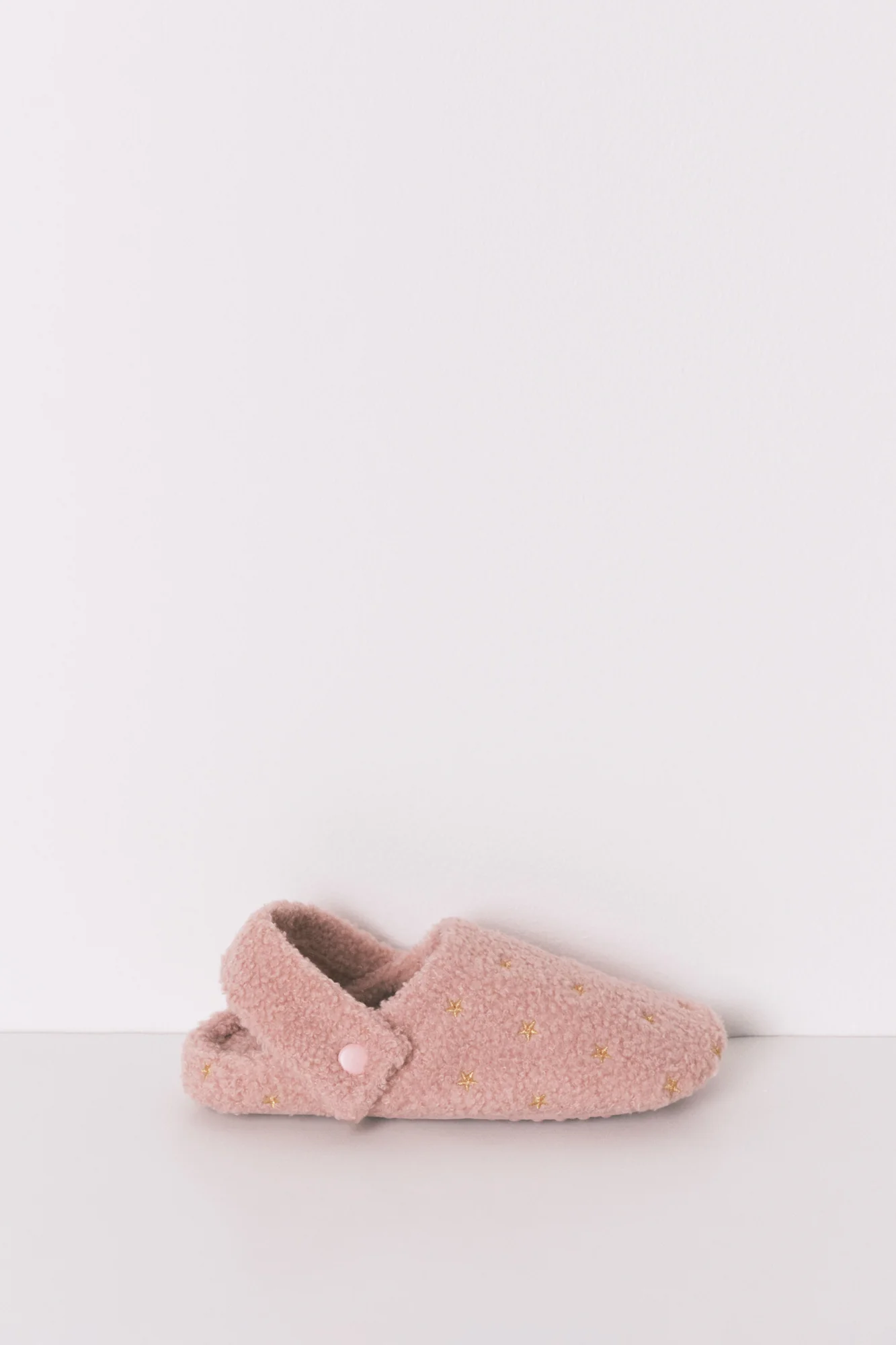 Pink glitter faux shearling slippers