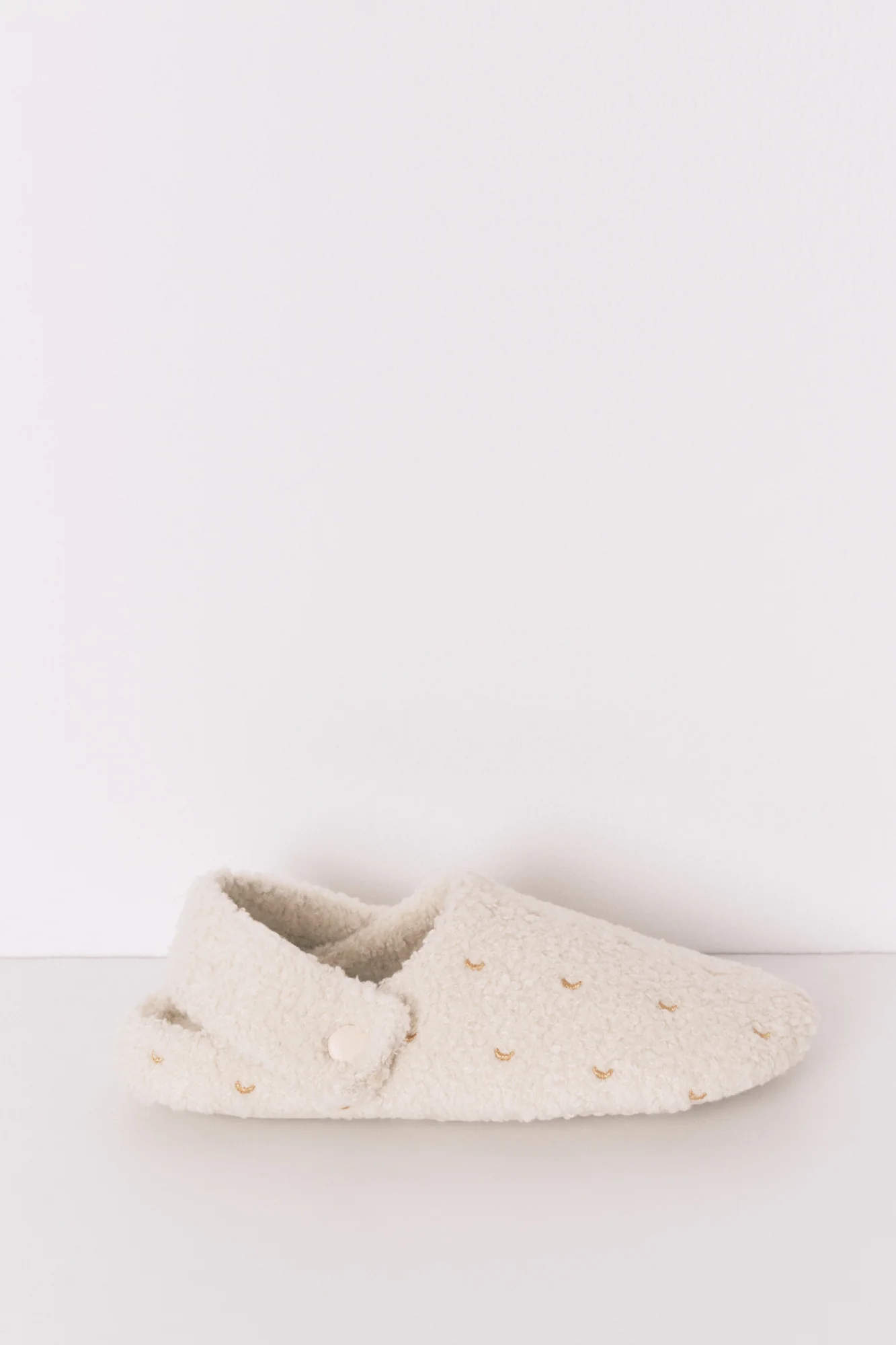 White glitter faux shearling slippers